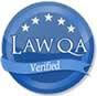 Logo Recognizing Rechtman & Spevak's affiliation with Law QA